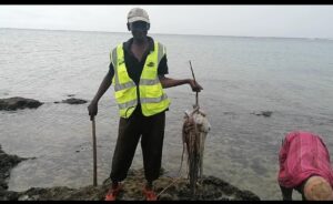 Munje BMU fisher Power Tabu displaying Octopus catch during the second opening of the Octopus Closure. Photo by Ruth Keah